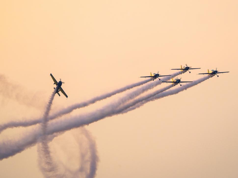 Free Image of A group of airplanes flying in the sky 