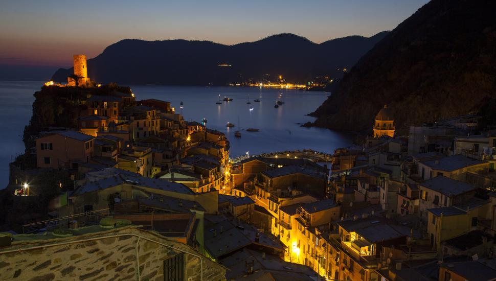 Free Image of A city by the water at night 