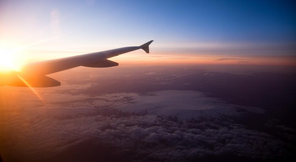 Free Image of An airplane wing in the sky 