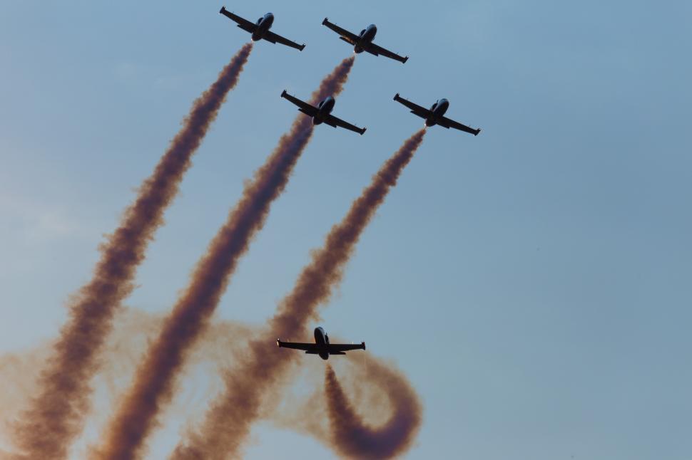 Free Image of A group of airplanes flying in the sky 