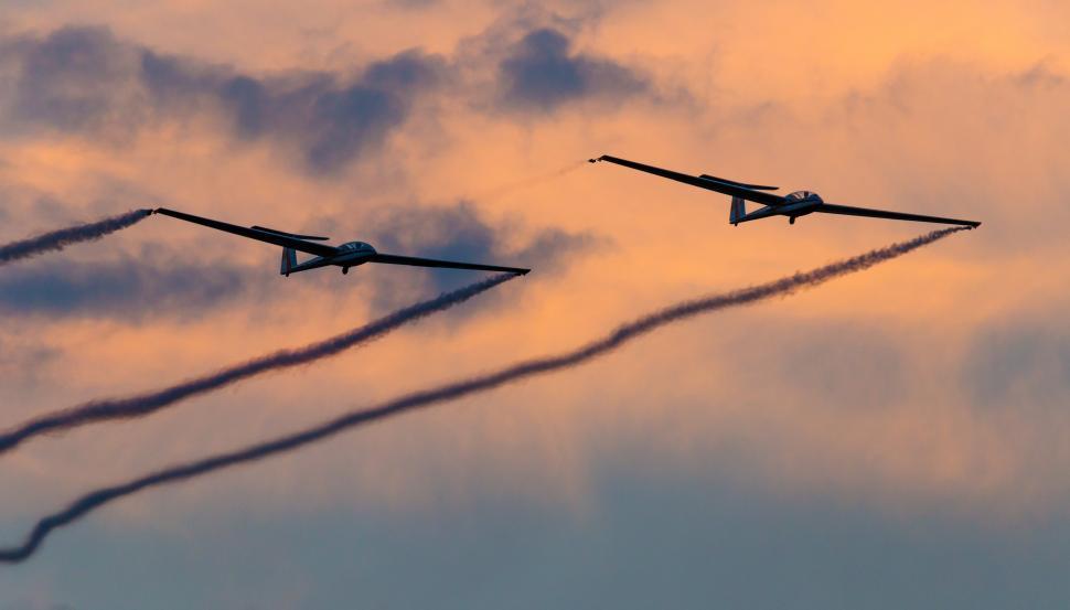 Free Image of A group of airplanes flying in the sky 