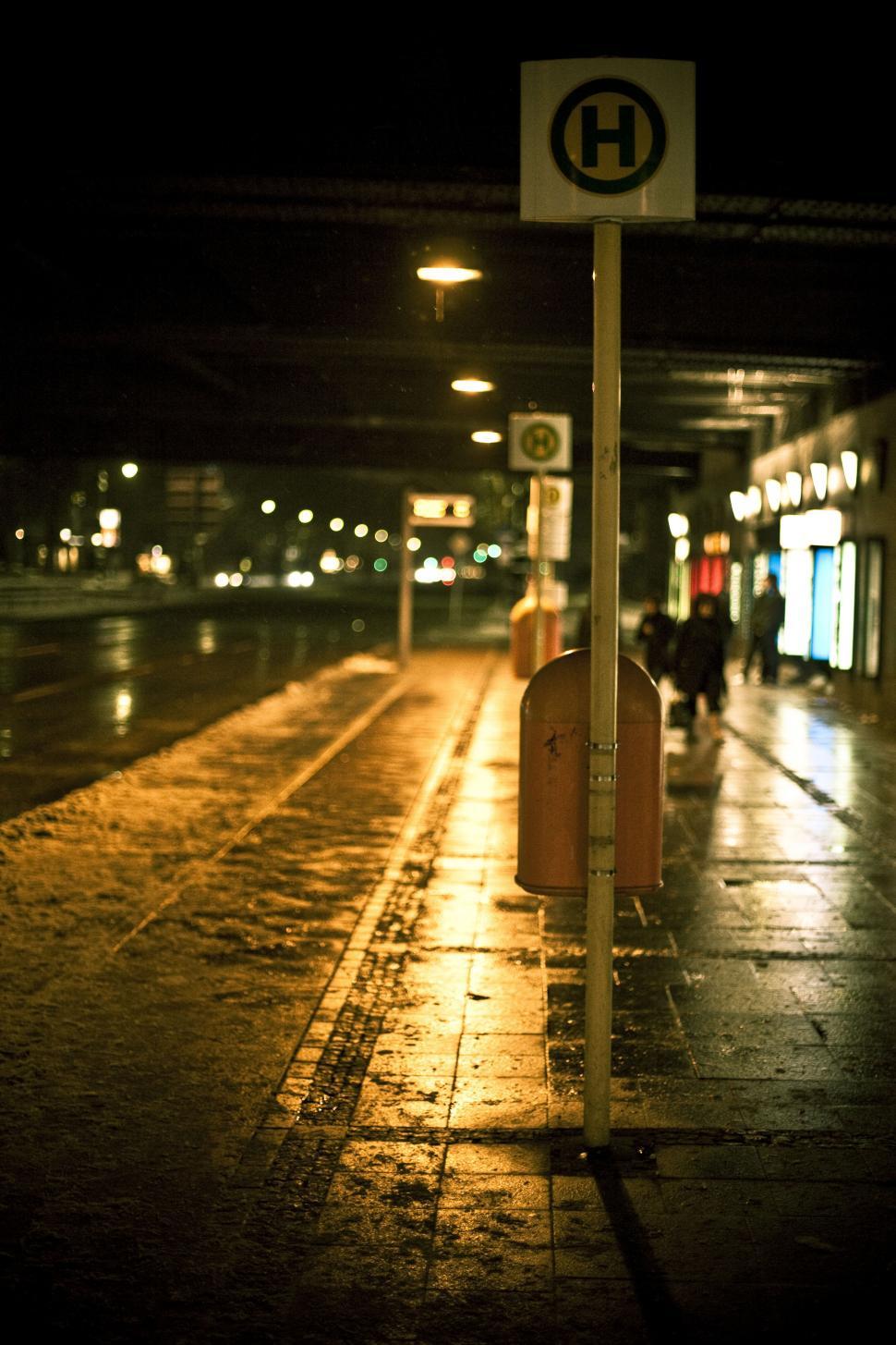 Free Image of A street sign on a sidewalk 