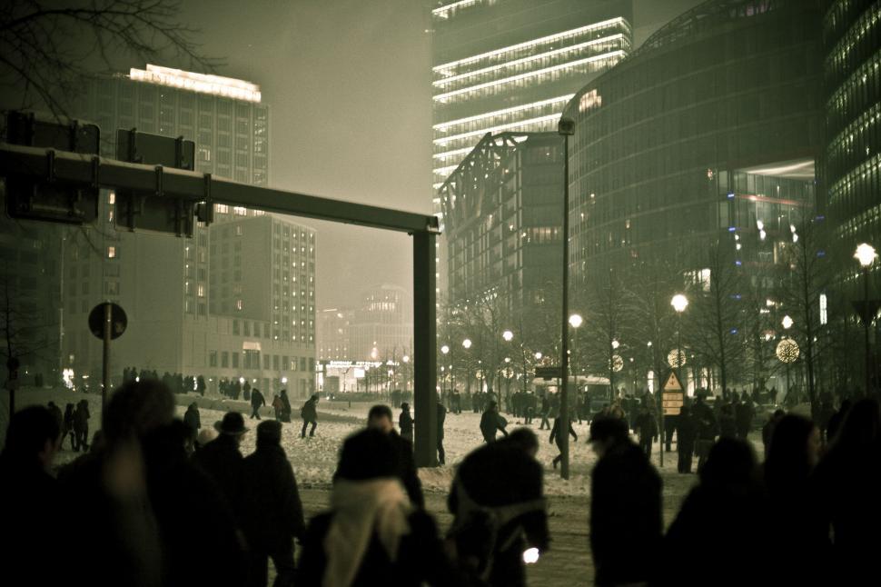 Free Image of A group of people walking in a city 