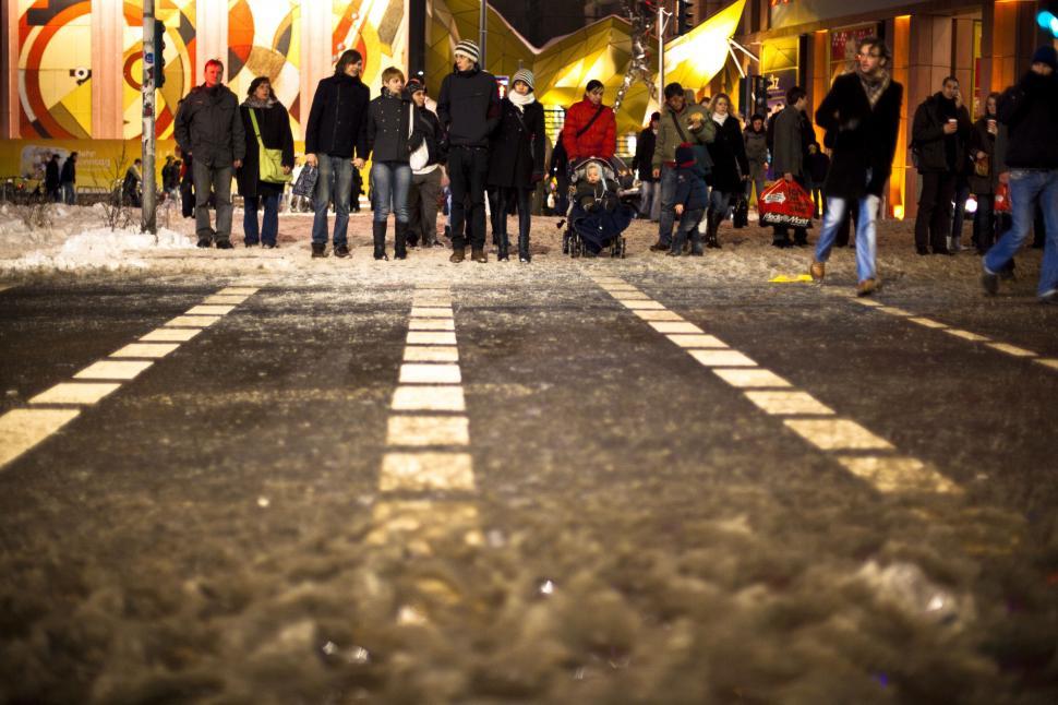 Free Image of A group of people standing in a street 