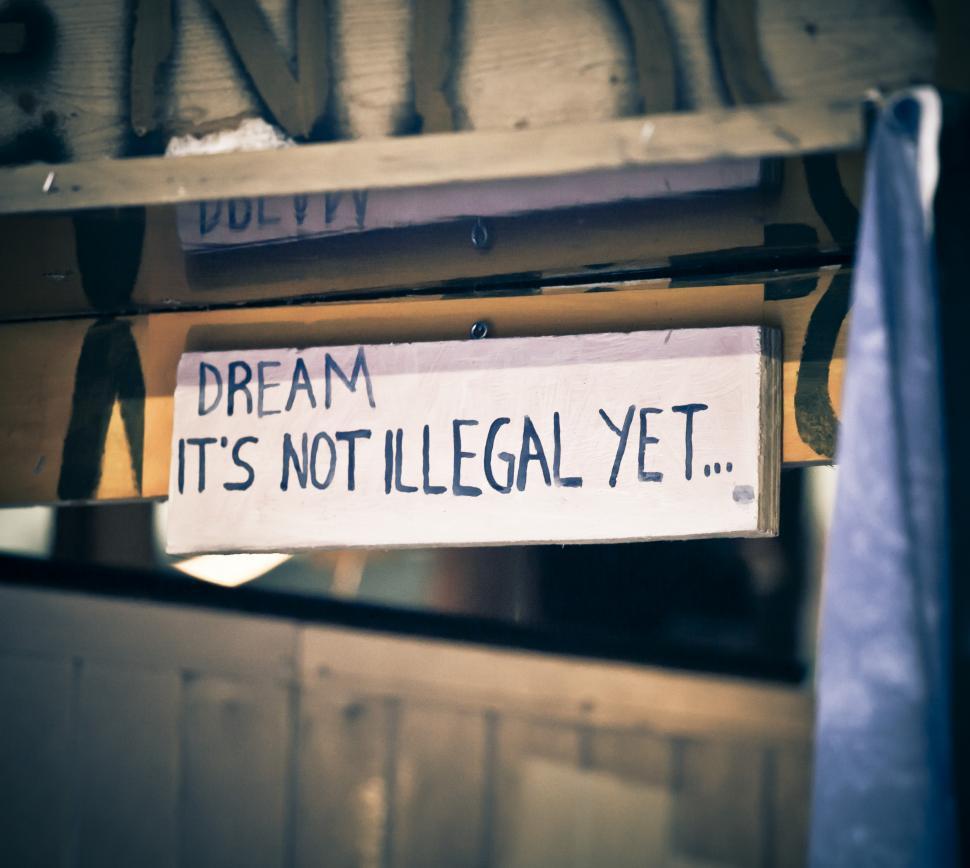 Free Image of A sign on a shelf 