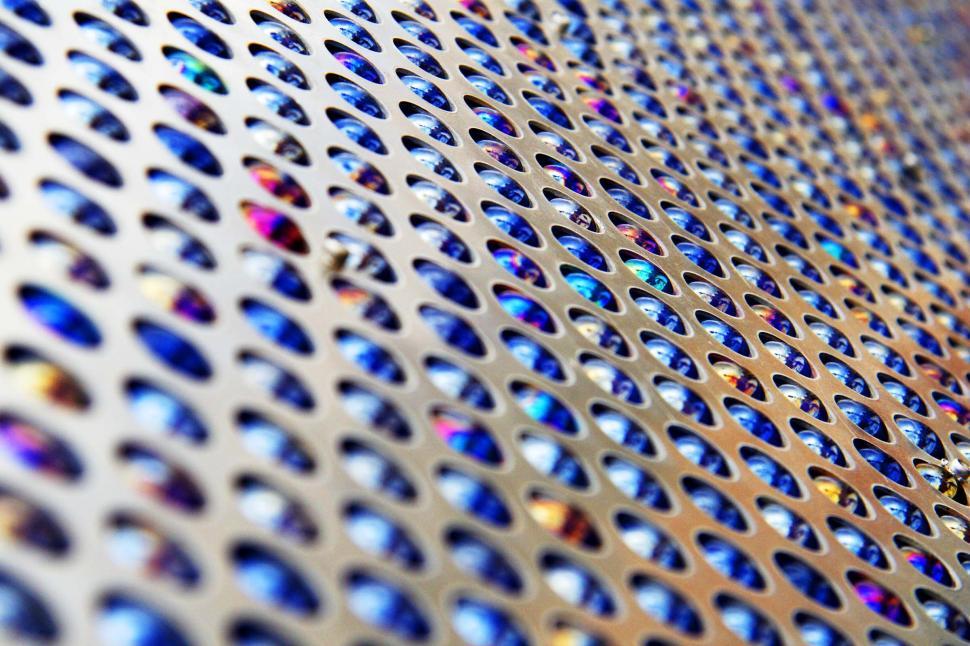 Free Image of Colored Glass Marbles in Metal 