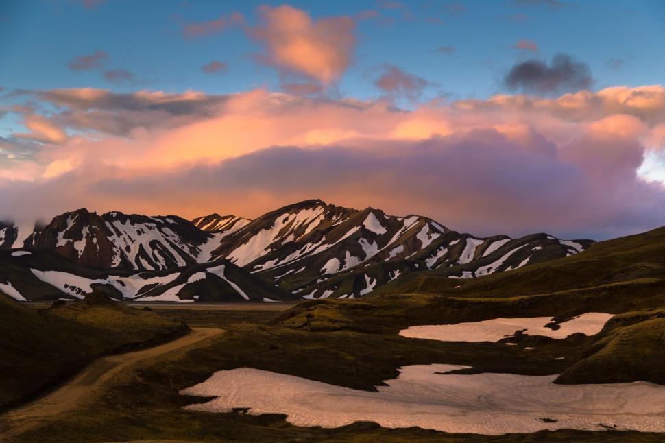 Free Image of A snowy mountains with a road 