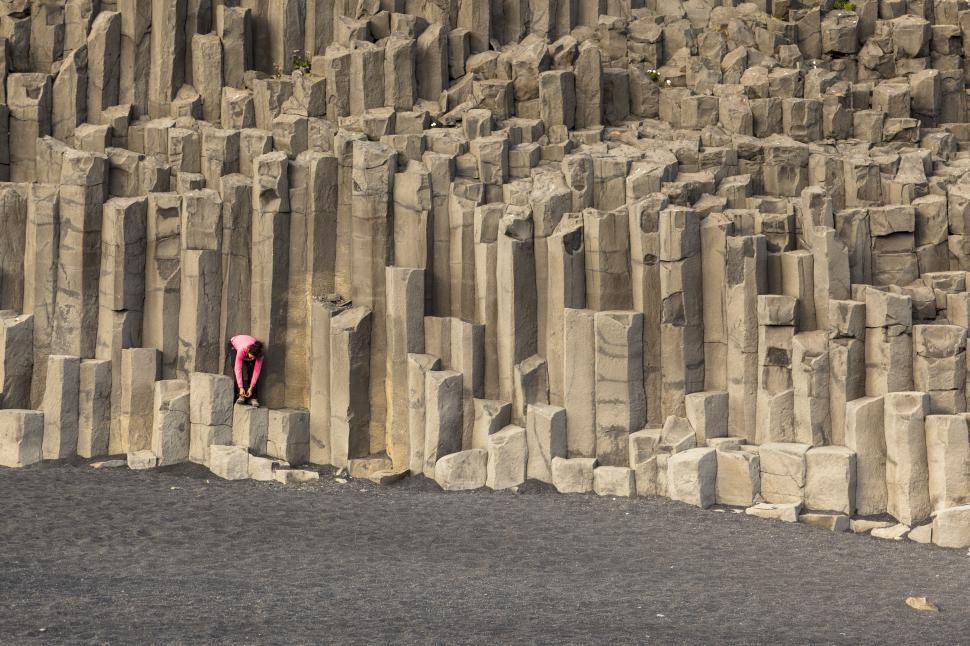 Free Image of A person climbing a rock wall 