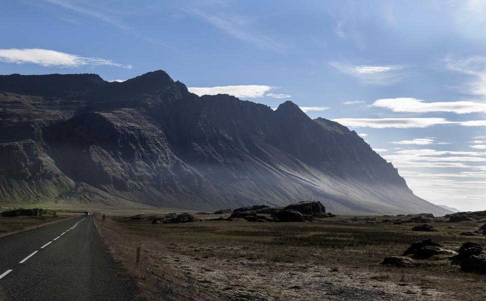 Free Image of A road with mountains in the background 