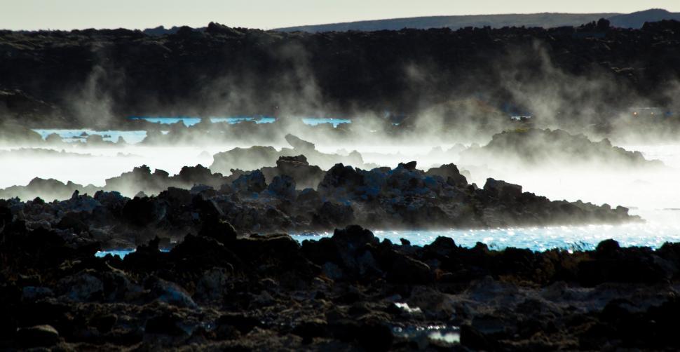 Free Image of A rocky area with steam coming out of it 