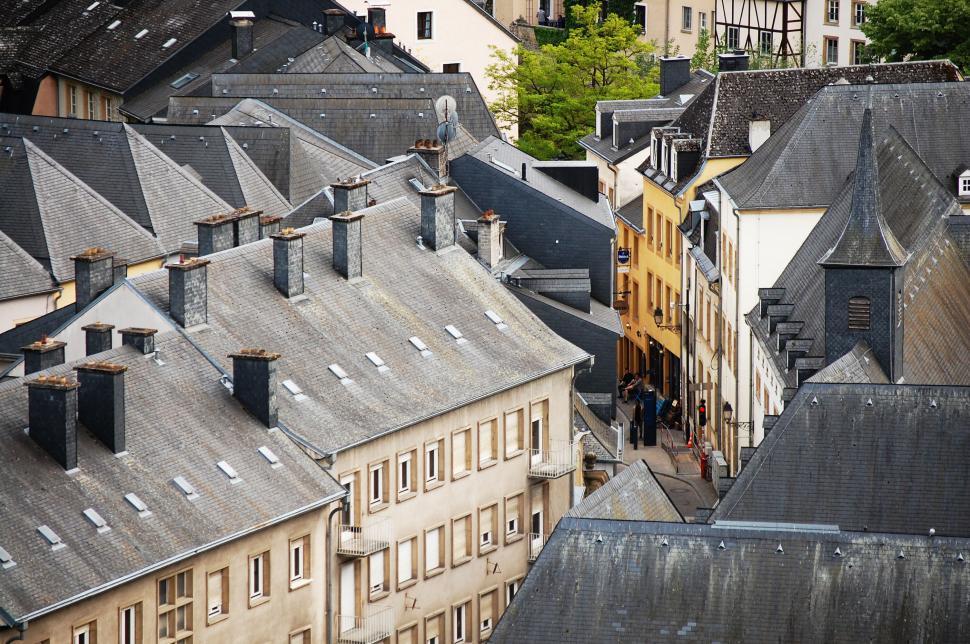 Free Image of A group of buildings with chimneys 