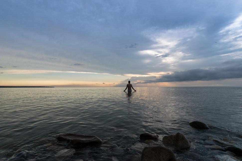 Free Image of A person standing in the water 