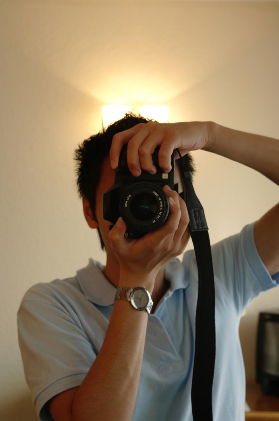 Free Image of Man Taking Selfie With Camera 