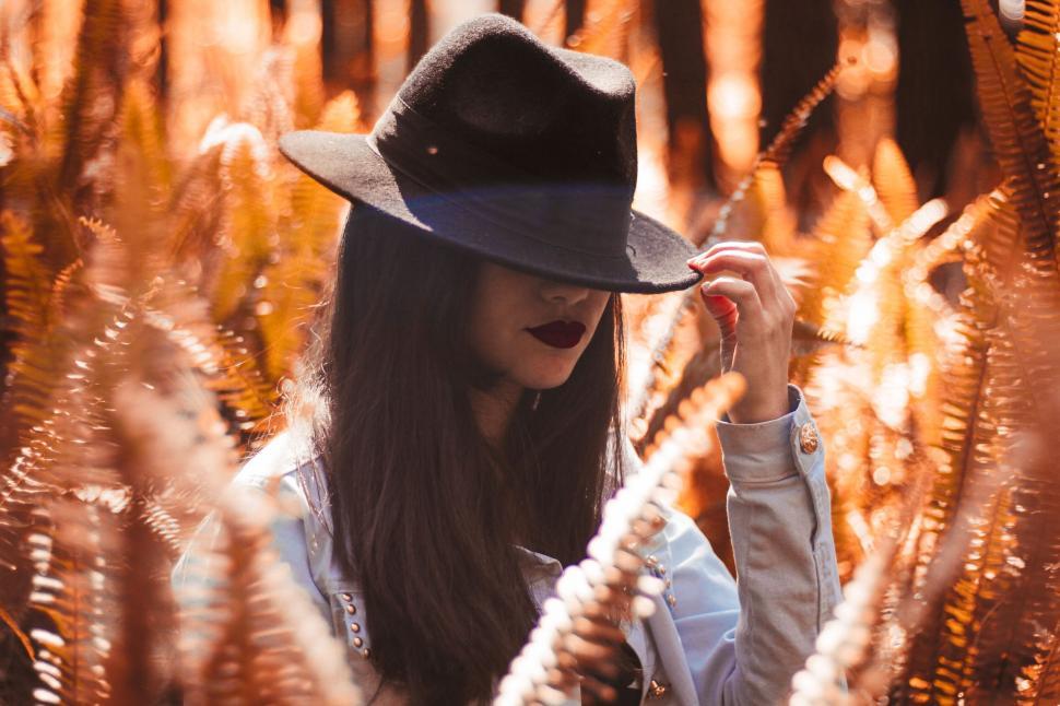 Free Image of A woman wearing a hat 