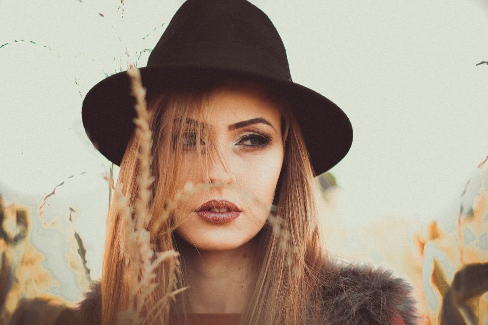 Free Image of A woman wearing a hat 