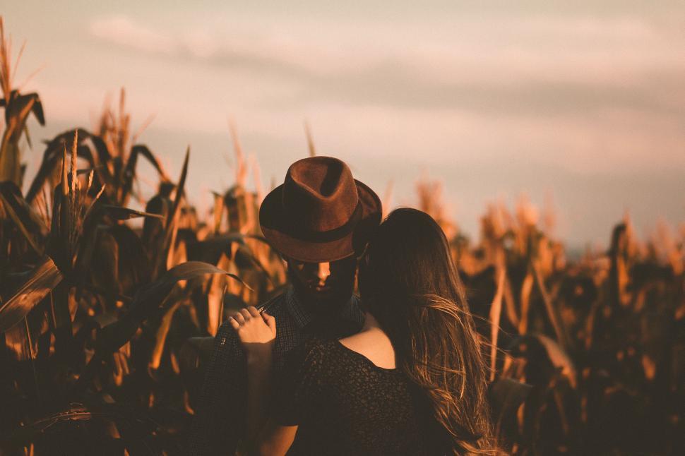 Free Image of A man and woman in a corn field 