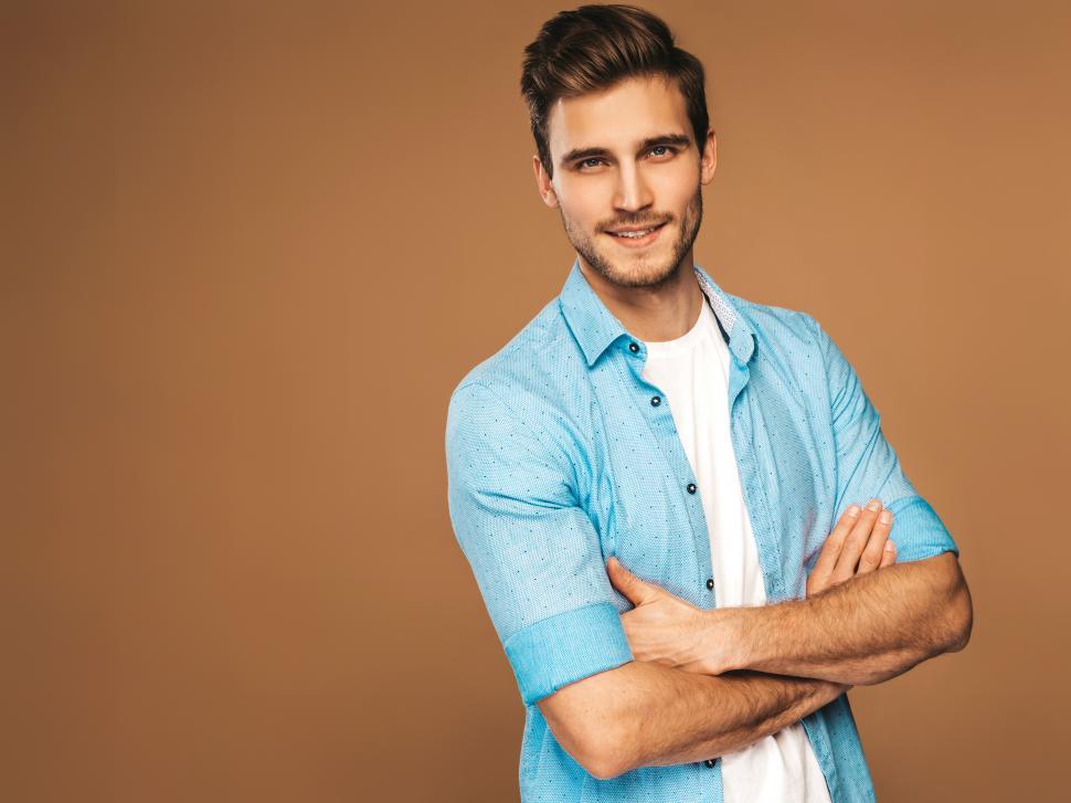Free Image of A man with his arms crossed 