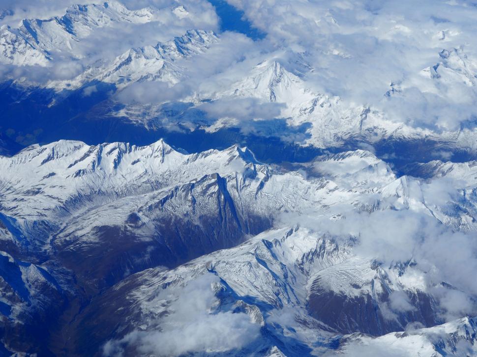 Free Image of A aerial view of snowy mountains 