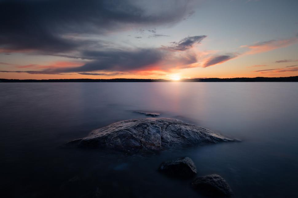 Free Image of A rock in the water 
