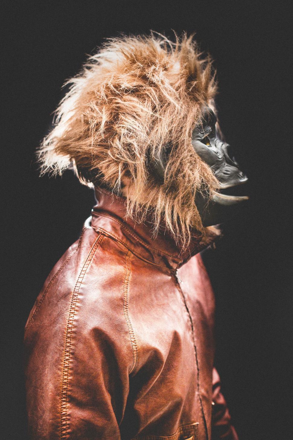Free Image of A person wearing a monkey mask 