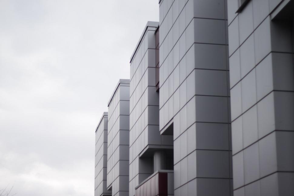 Free Image of A row of white buildings 