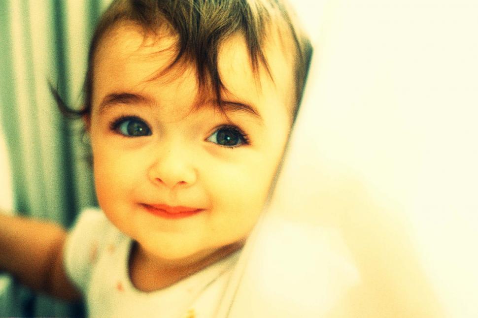 Free Image of Toddler looks at camera 
