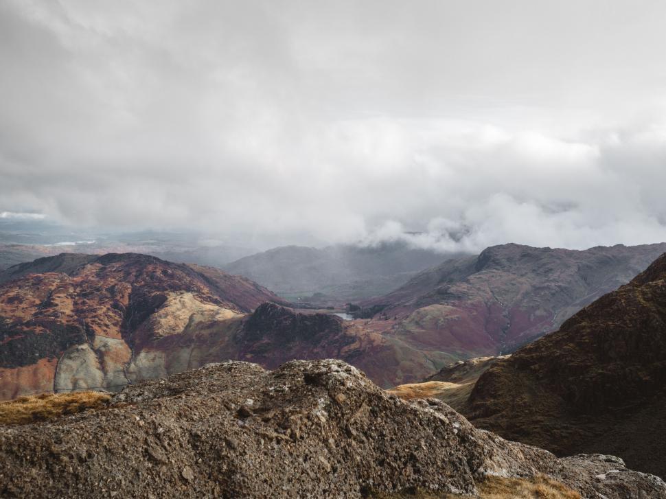 Free Image of A landscape of mountains and clouds 