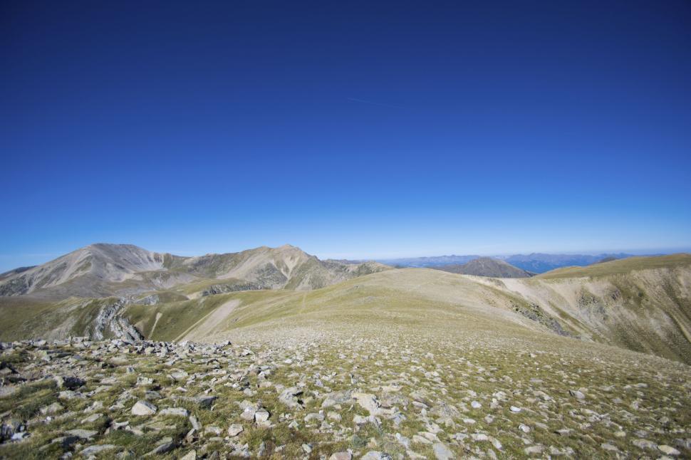 Free Image of View of a Mountain Range From the Top of a Hill 