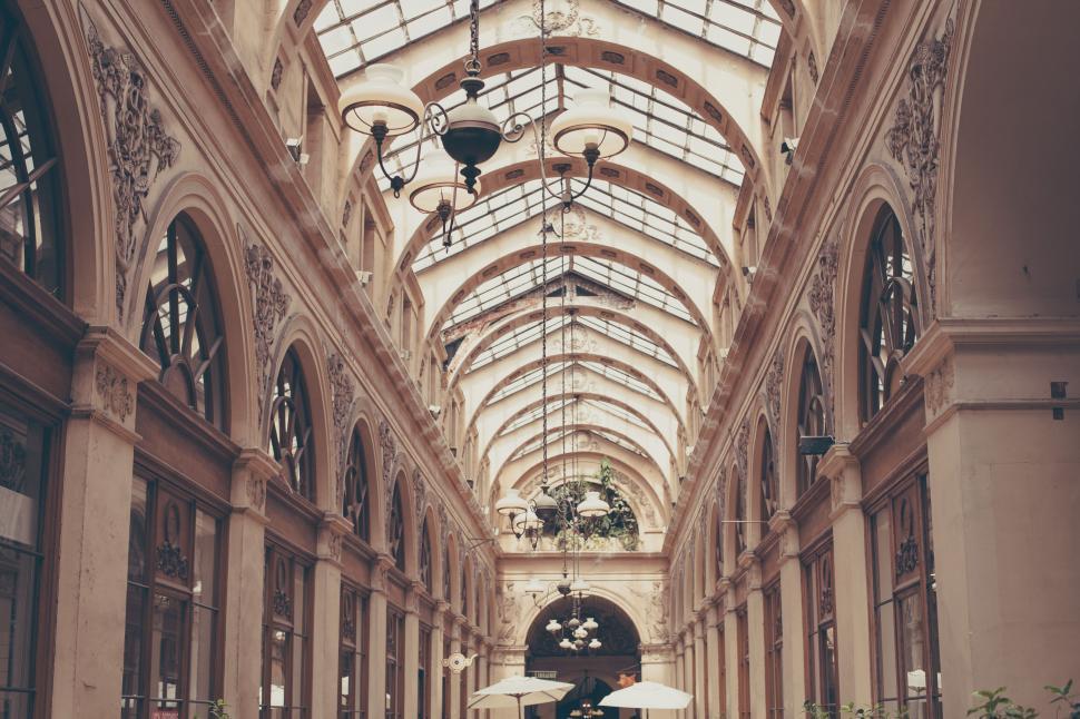 Free Image of A building with many windows and a glass roof 