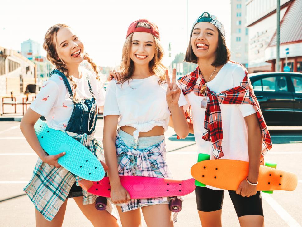 Free Image of A group of girls posing for a picture 