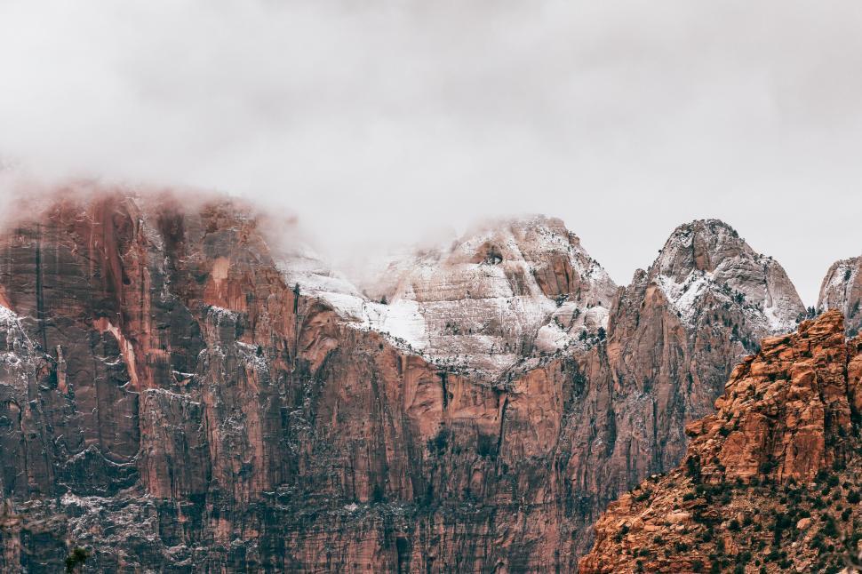 Free Image of A snow covered mountain tops 