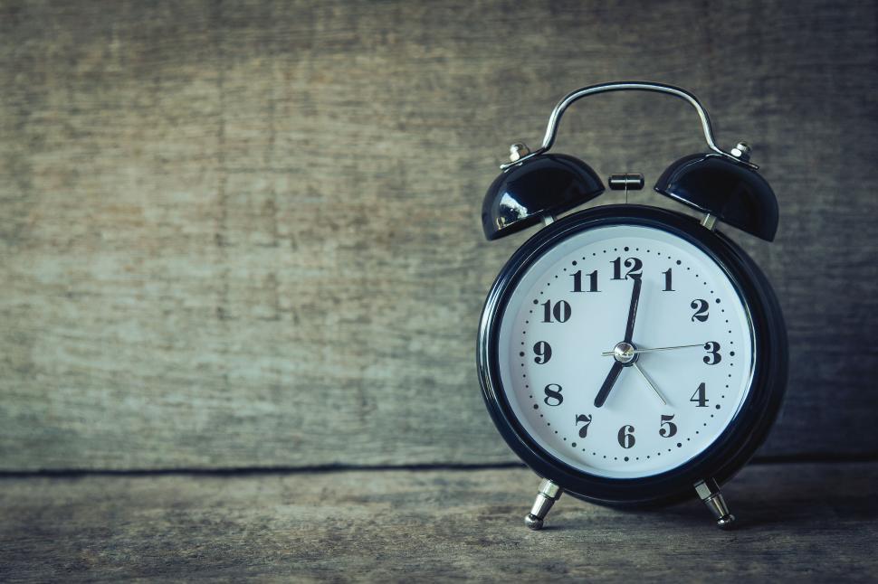Free Image of A black and white alarm clock 