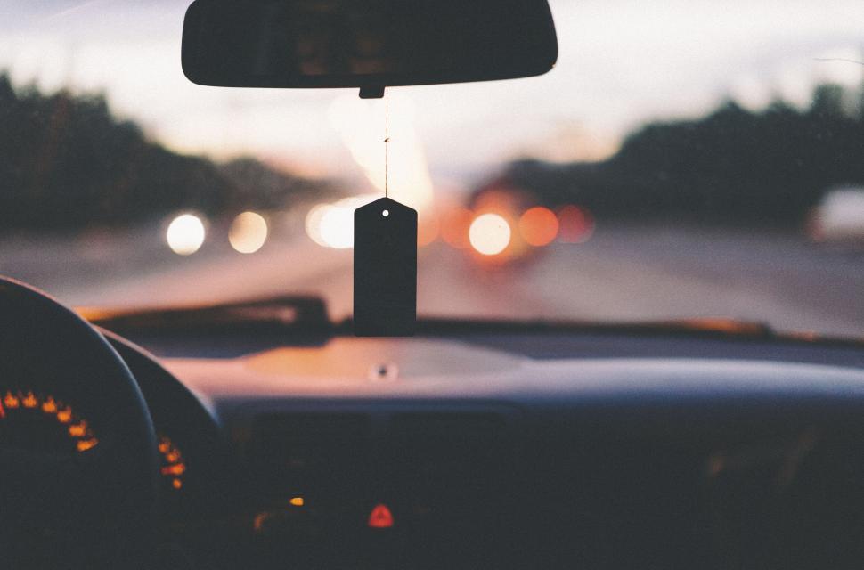 Free Image of A car with a tag from the dashboard 
