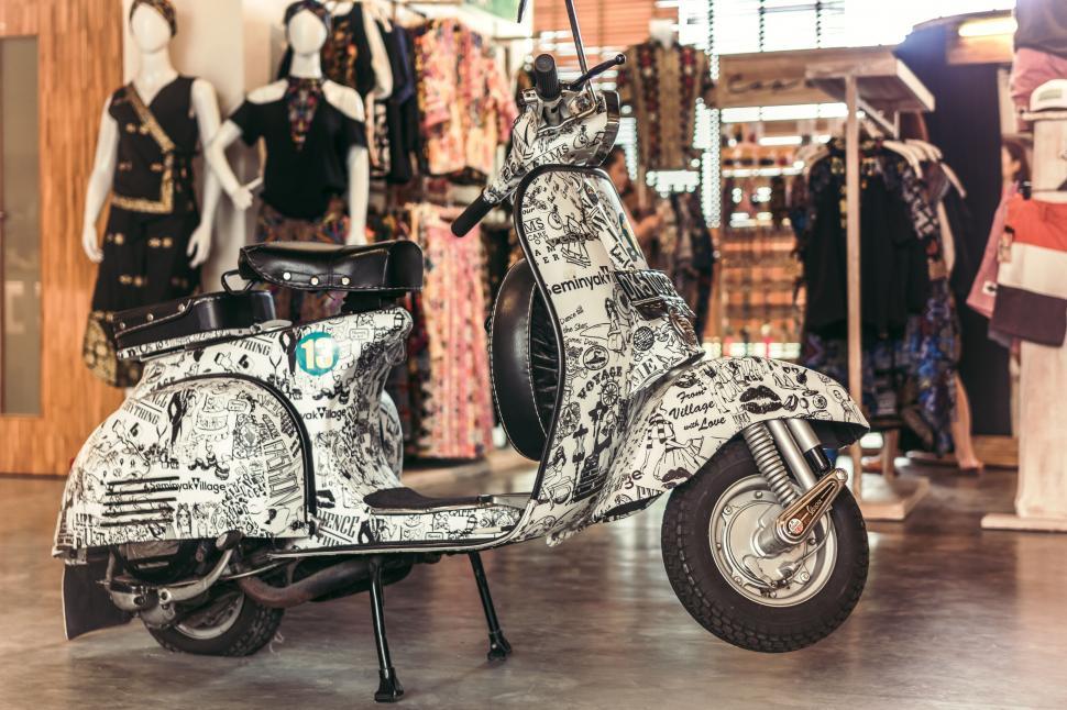 Free Image of A white scooter with black text on it 