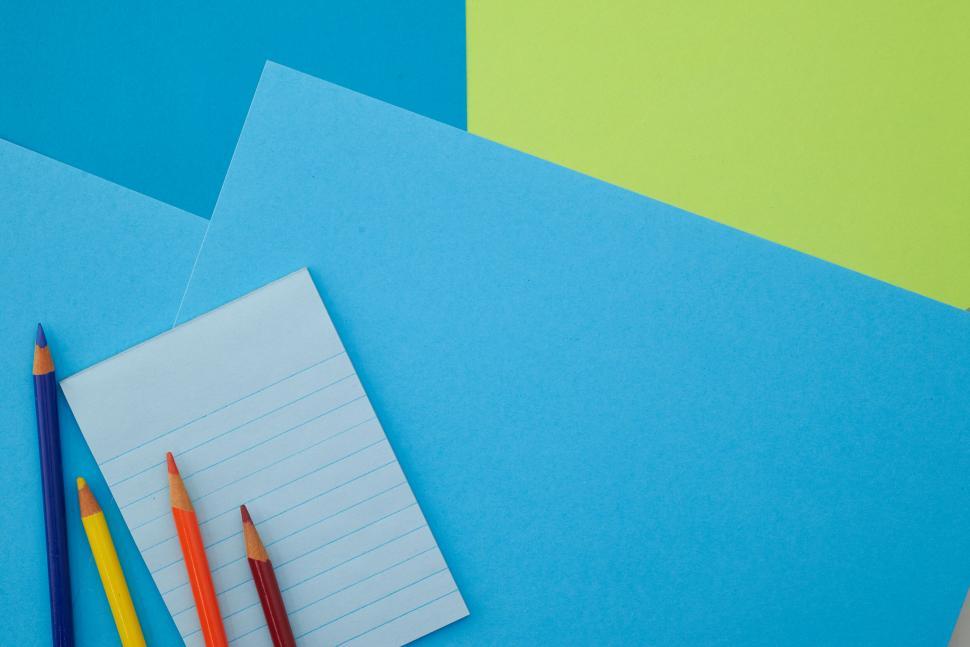 Free Image of A group of colored pencils on a piece of paper 