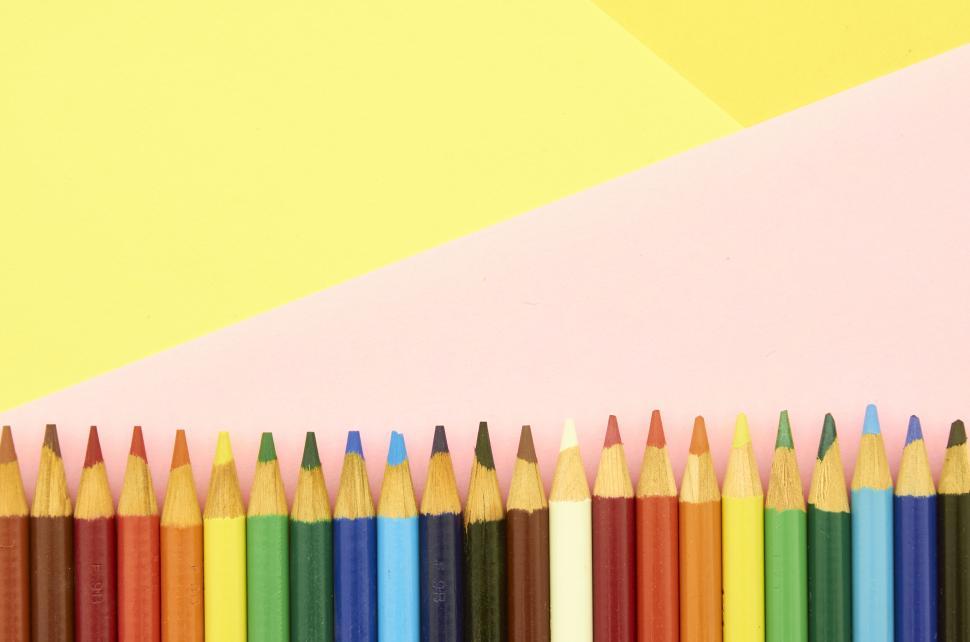 Free Image of A row of colored pencils 