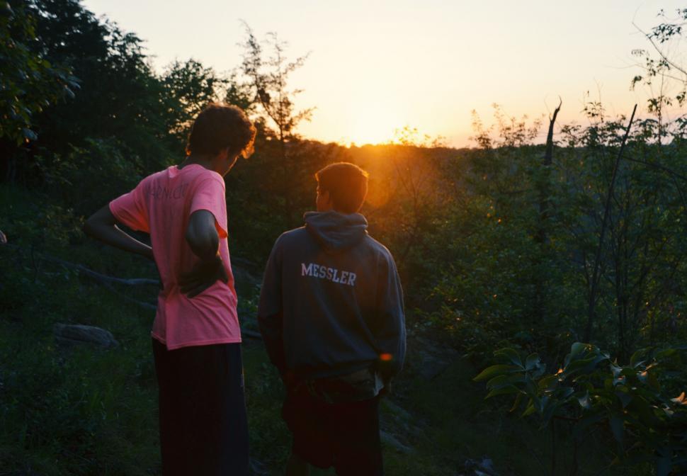 Free Image of Two people standing in a forest 