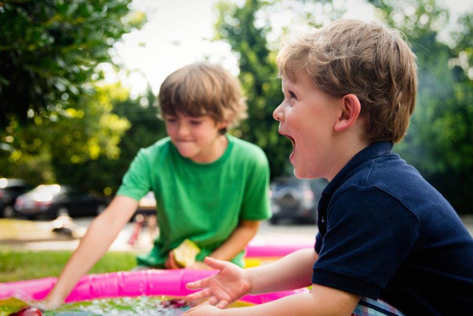 Free Image of A group of kids playing in a pool 