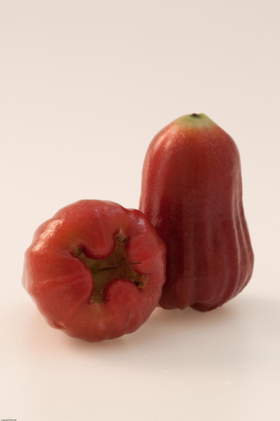 Free Image of Red Peppers on White Table 