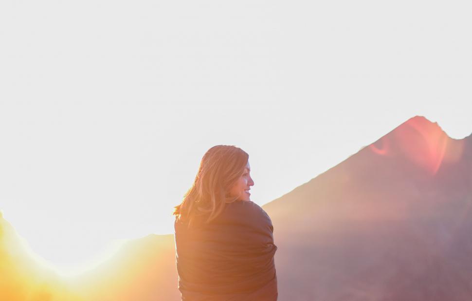 Free Image of A woman wrapped in a blanket 