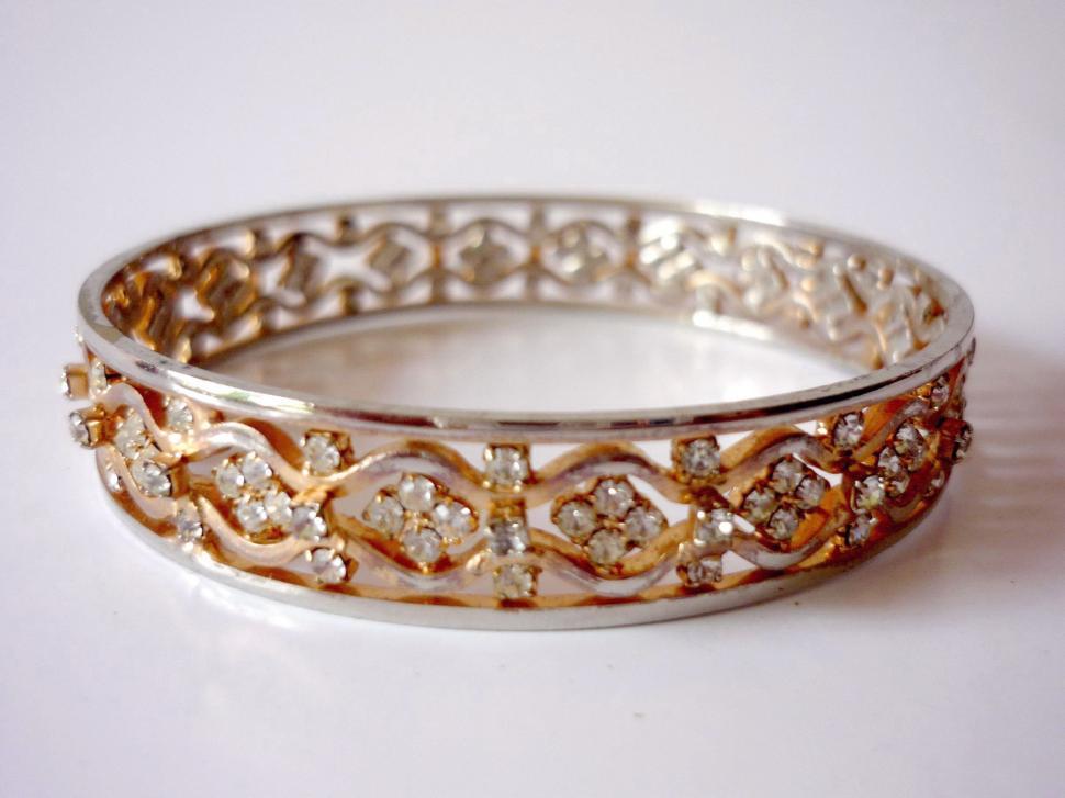 Free Image of Close Up of a Ring on a White Surface 