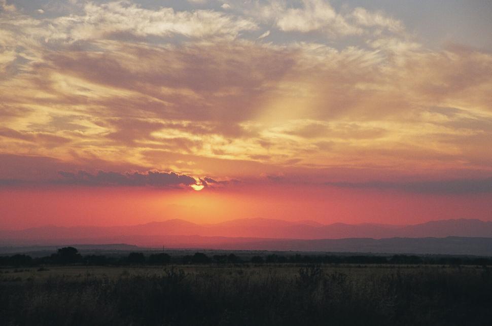 Free Image of Sunset silhouette with orange sky 