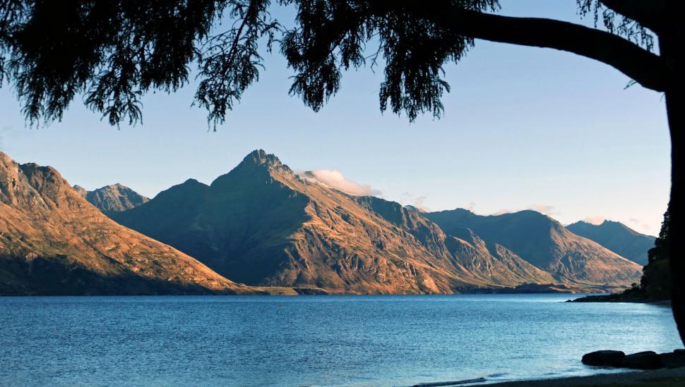 Free Image of Mountain landscape during sunset by the lake 