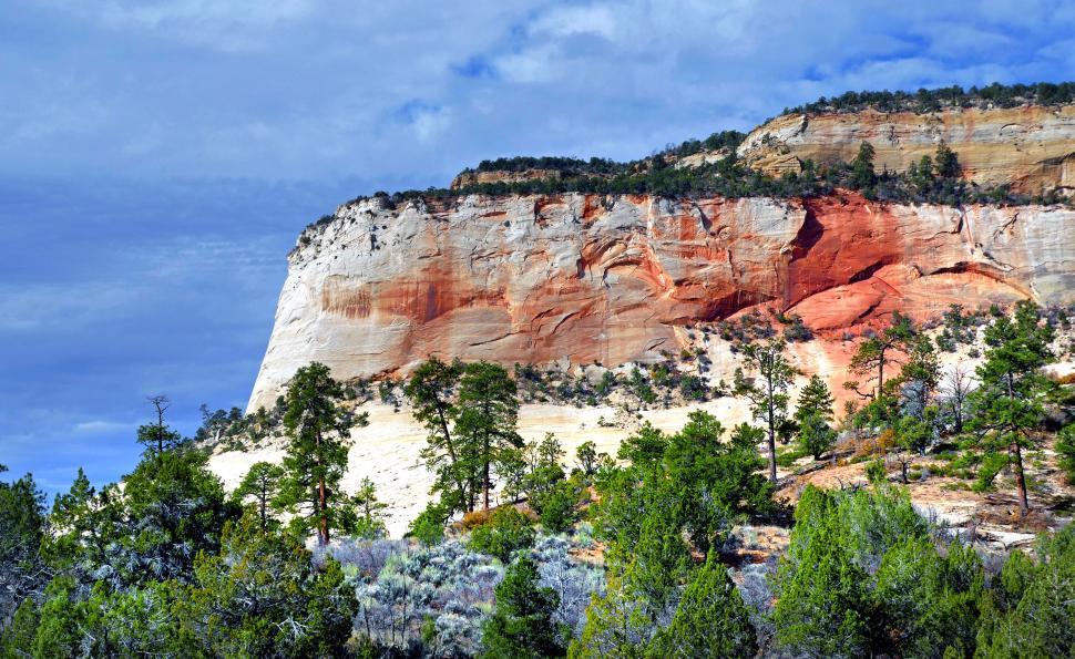 Free Image of Majestic mountain with stratified rock layers 
