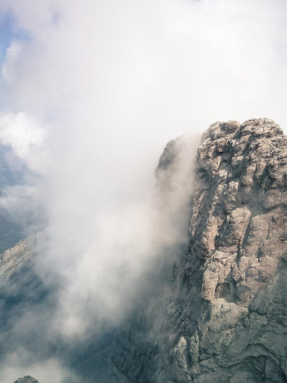 Free Image of Majestic mountain peak among clouds 