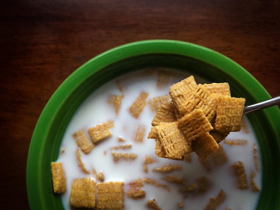 Free Image of Morning cereal with milk in colorful bowl close-up 