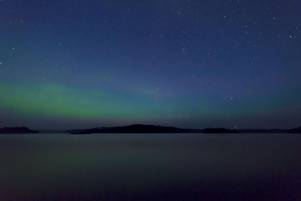 Free Image of Night sky adorned with stars and aurora 