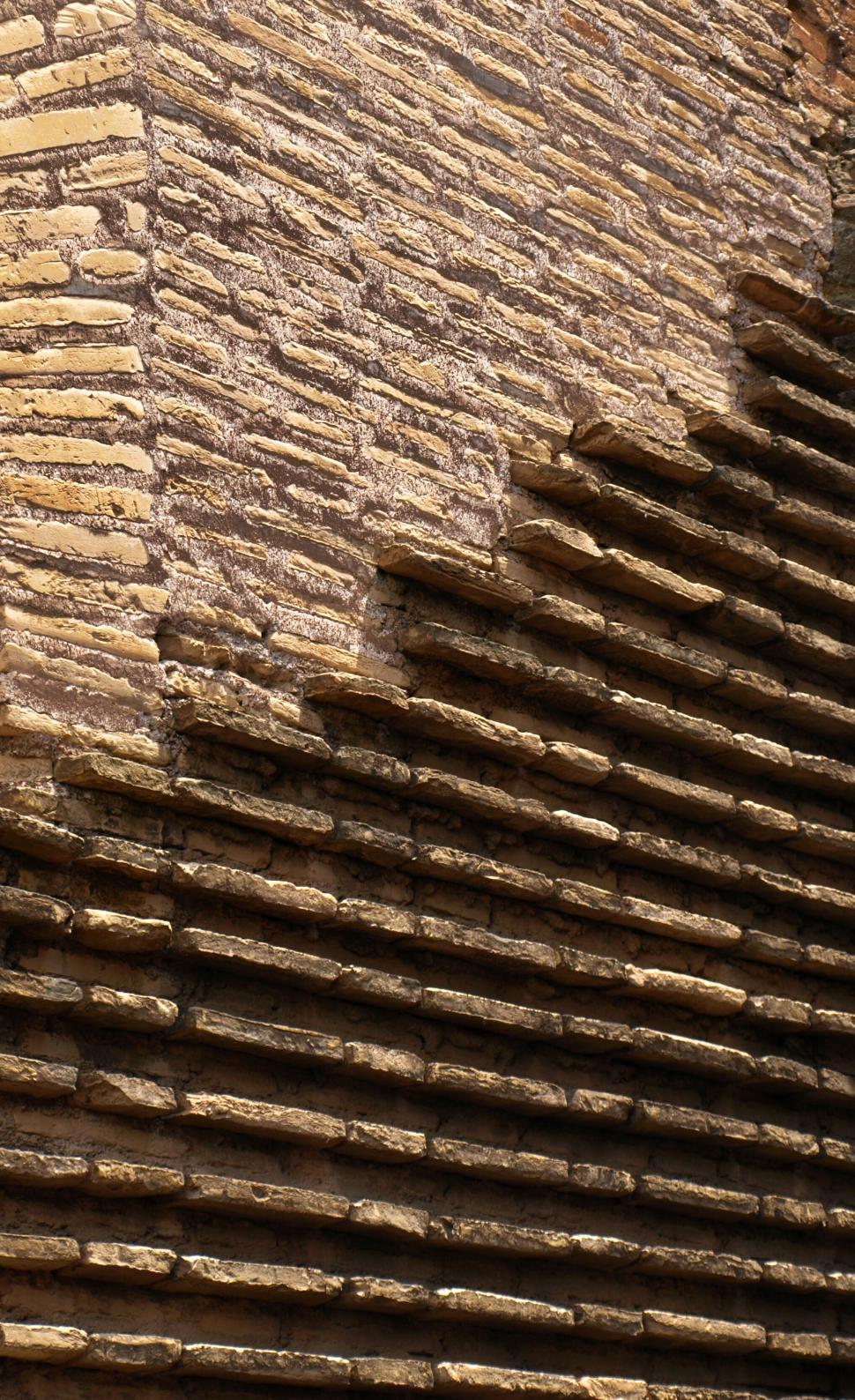 Free Image of Stone wall texture in close view 