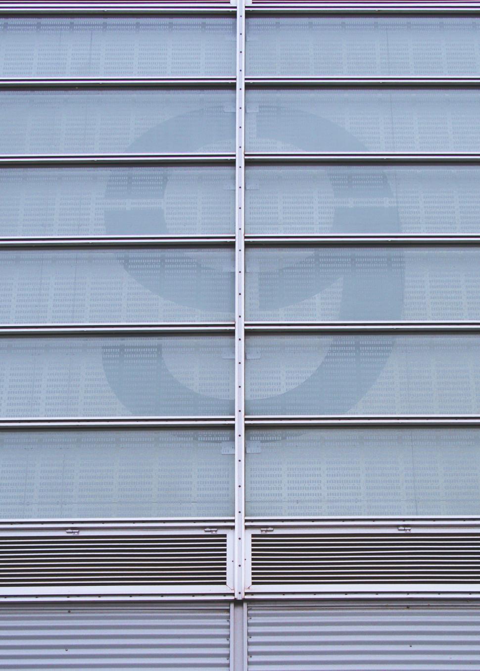 Free Image of Modern building with dot pattern and symmetry 