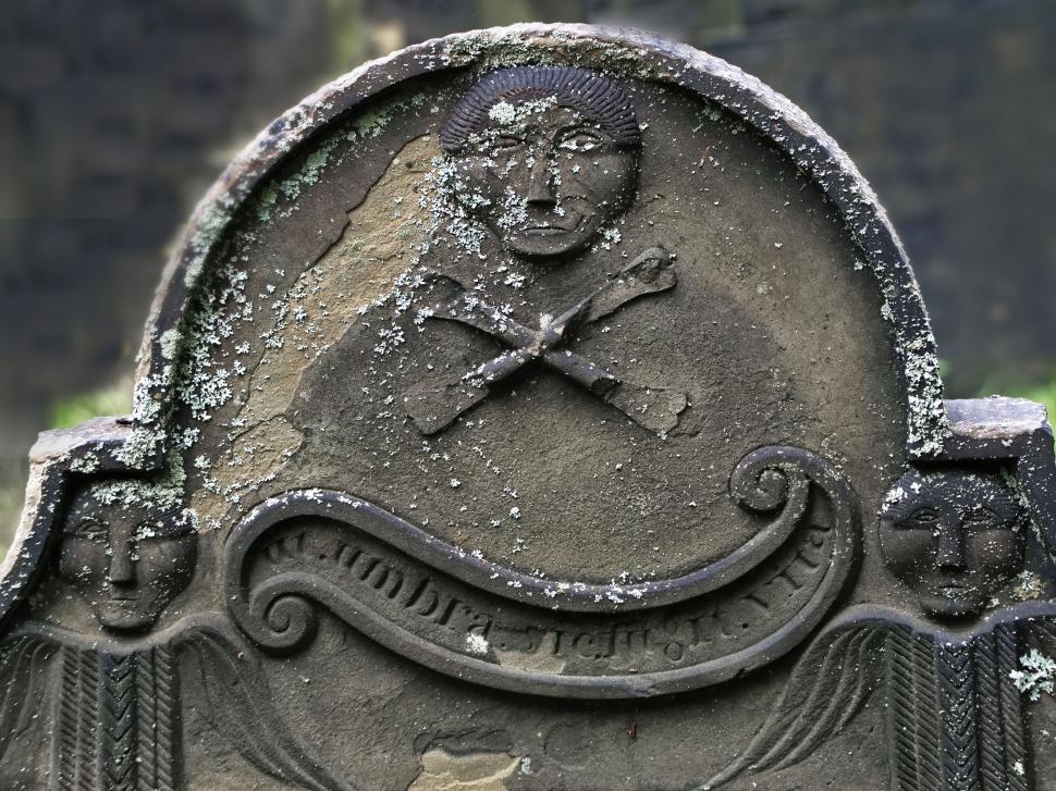 Free Image of Ancient gravestone with cross and lichen 
